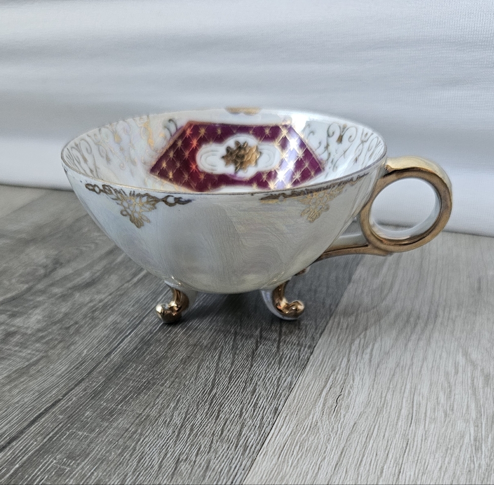Ornate Gold-Trim Porcelain Teacup with Footed Base - White and Burgundy